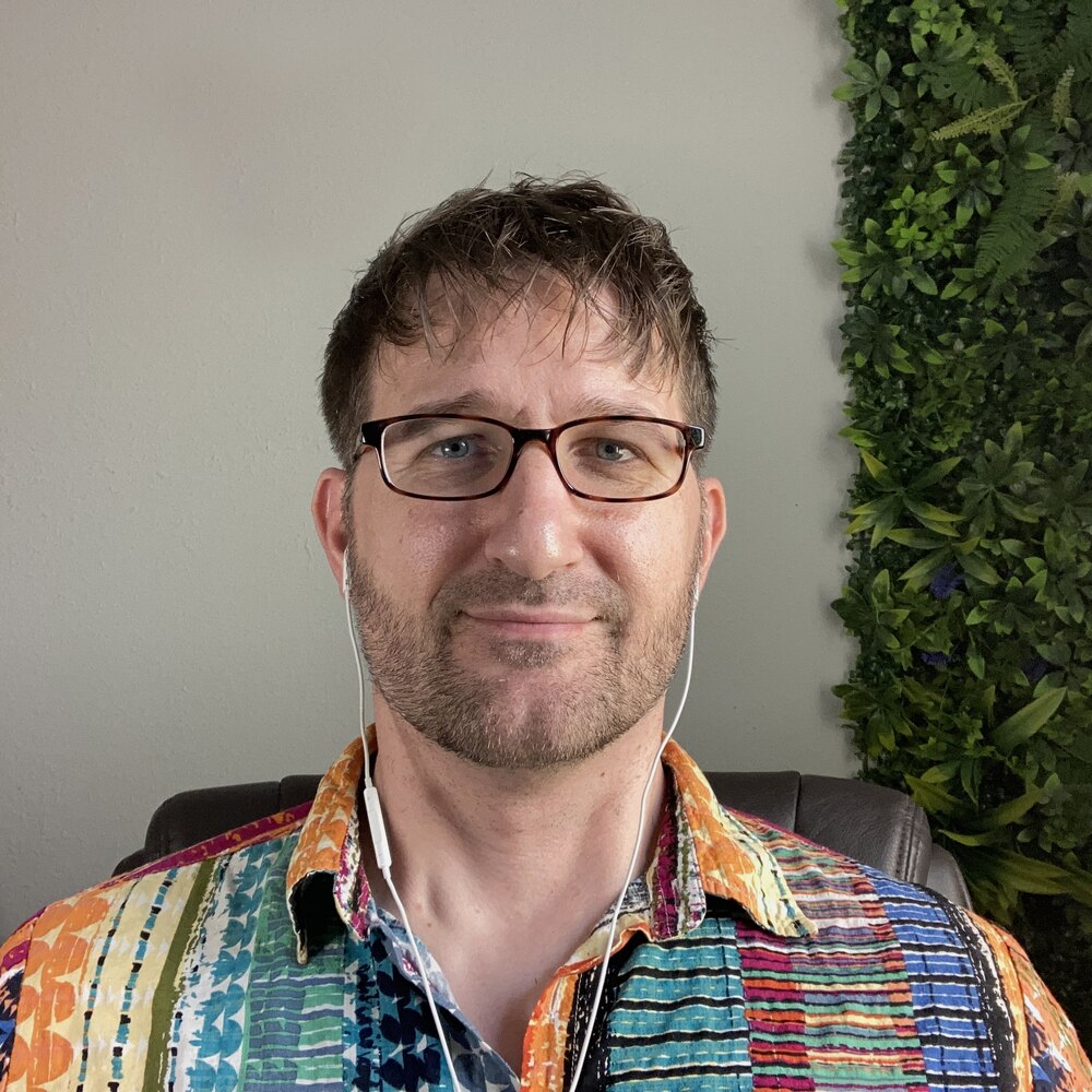 Owen Smithyman on a video call, as clients meet him for a session